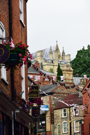 LINCOLN UK 20 JULY  2015: Looking up at Lincoln Cathedral from steep Hillのeditorial素材