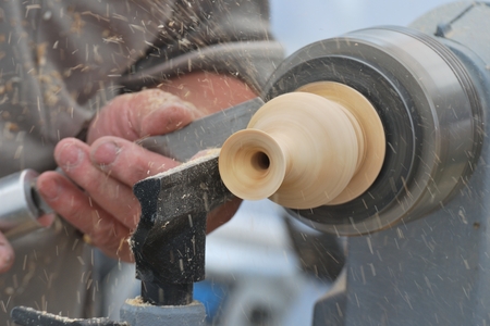 Preparing wood on latheの写真素材