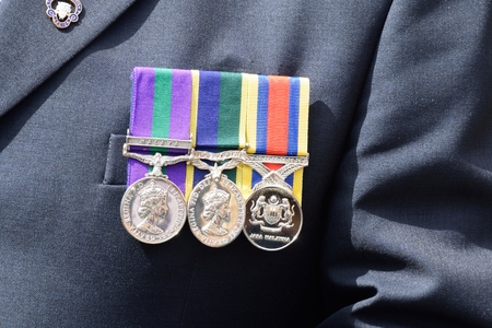 CRESSING TEMPLE ENGLAND 17 May 2015: War medals pinned to veterans chest