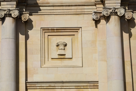 Wheat symbol on side of buildingの写真素材