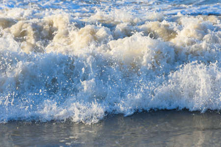 Detail of wave breaking onshoreの写真素材