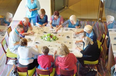 North Sea  England, United Kingdom -  July  28, 2016: Art class taking place on cruise with small group of passengersのeditorial素材