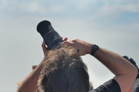 Clacton on Sea , United Kingdom - August 26, 2016: Man pointing Camera to sky at Clacton free ...