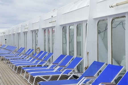 Sun loungers on deck of cruise ship