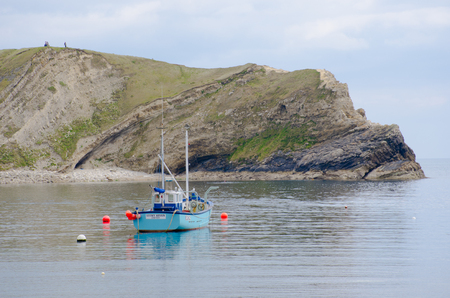 Lulworth Cove Dorset United Kingdom -22 April 2017: Fishing boat at Lulworth Cove Dorsetのeditorial素材