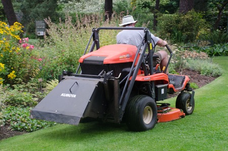 Norfolk  United Kingdom   August  21 2017: Man driving large ride on mowerのeditorial素材
