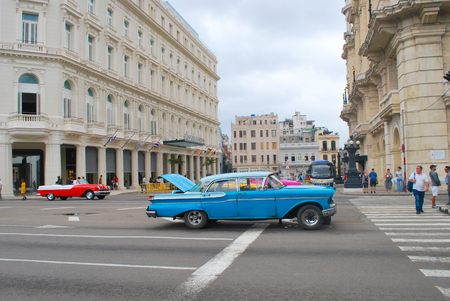 Havana Cuba - 26 January 2018: Broken down blue classic american car in main street of Havanaのeditorial素材