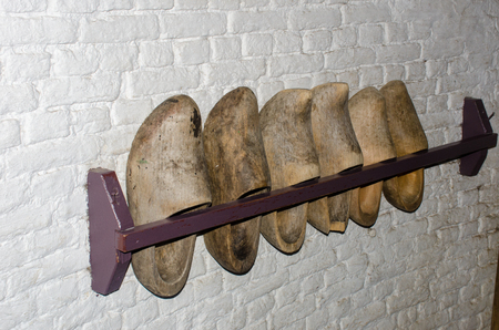 Rack of wooden clogs