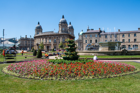 Hull Yorkshire UK  - 27 June 2018: Hull Dock  Offices with town park in foregroundのeditorial素材