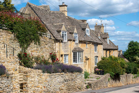 Row of Country cottages in village of Bourton on the Hill the Cotswoldsの写真素材