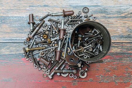 Pile of used construction parts like nails, screws and nutsの写真素材