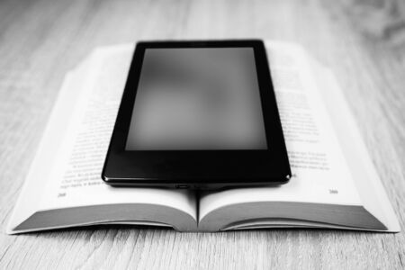 Old book and modern one. Black and white