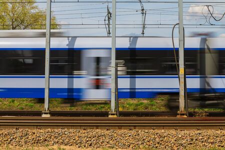 Speeding Train on suburban railsの写真素材