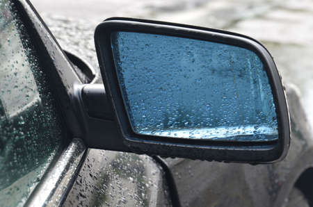 External car mirror in raindropsの写真素材