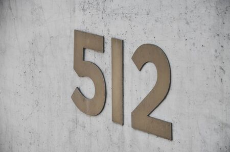 Number 512 on the beton wallの写真素材
