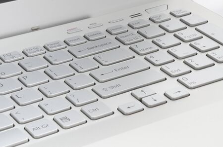 Silver laptop keyboard with Enter buttonの写真素材