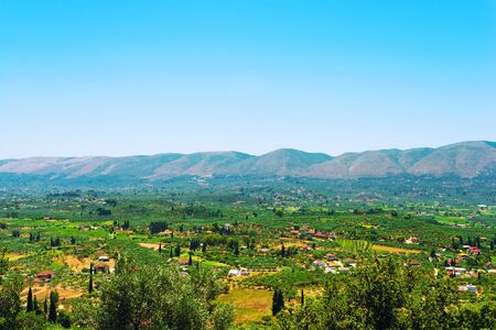 Panorama of village in mountain valley; Landscape nature backgroundの写真素材