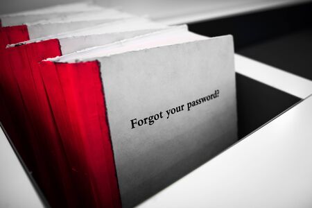 Forgot your password. White book with red binding and phrase Forgot Your Password on the cover. Technology concept. Selective colorの写真素材