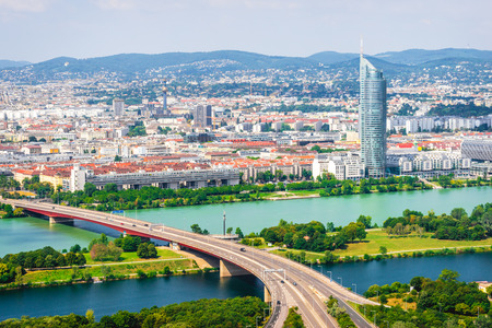 Panorama of Vienna city with bridge over Danube river and New Danube canalの写真素材