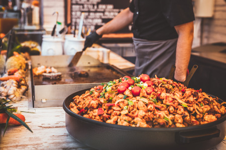 Delicious plate of meat at street cafe. Lunch from food truck. Traditional european cuisineの写真素材
