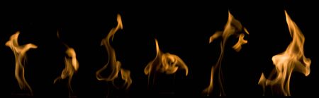 Real fire flames set isolated on blackの写真素材
