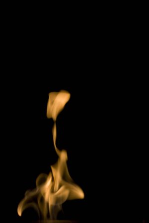 Real fire flames isolated on blackの写真素材