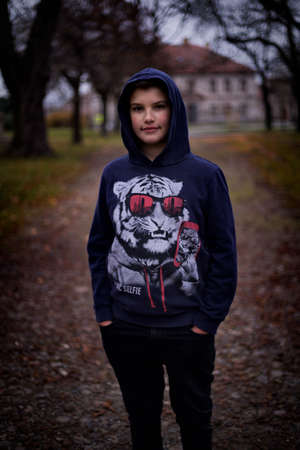 A nice boy posing in wild natureの写真素材
