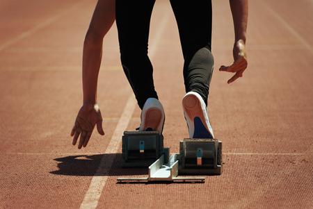 Sprint start in track and fieldの写真素材