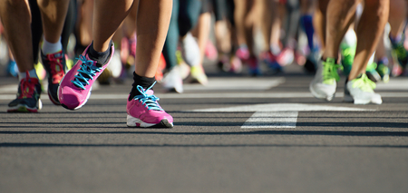 Marathon running in the light of eveningの写真素材