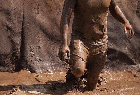 Mud race runners,during extreme obstacle races
