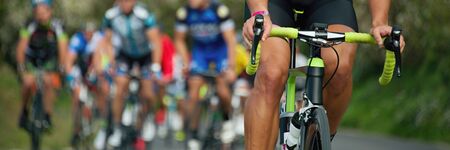 Cycling competition, cyclist athletes riding a raceの写真素材