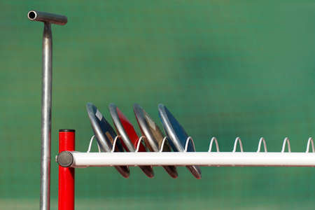 Athletics throw the discus, prepare the discus in the rack