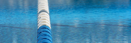 Empty swimming pool with lane. Lanes of a competition swimming pool blur