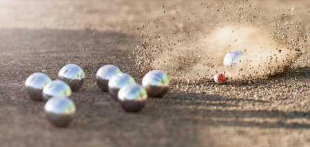 Petanque ball boules bowls on a dust floor, photo in impact. Game of petanque on the ground. Balls and a small wood jackの写真素材