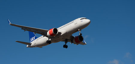 Tenerife, Spain January 7th, 2024. Airbus A320-251N SAS Airlines flies in the blue sky. Landing at Tenerife Airportのeditorial素材