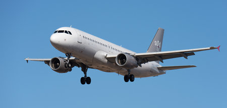 Tenerife, Spain January 17th, 2024. Airbus A320-214 Sundair Airlines flies in the blue sky. Landing at Tenerife Airportのeditorial素材