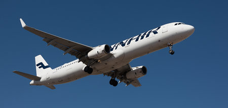 Tenerife, Spain January 31 st, 2024. Airbus A321-231 Finnair Airlines flies in the blue sky. Landing at Tenerife Airportのeditorial素材