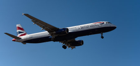 Tenerife, Spain February 16th, 2024. Airbus A321-231 British Airways Airlines flies in the blue sky. Landing at Tenerife Airportのeditorial素材