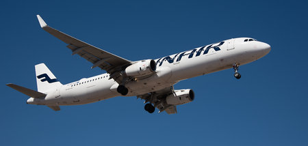 Tenerife, Spain February 21 st, 2024. Airbus A321-231 Finnair Airlines flies in the blue sky. Landing at Tenerife Airportのeditorial素材