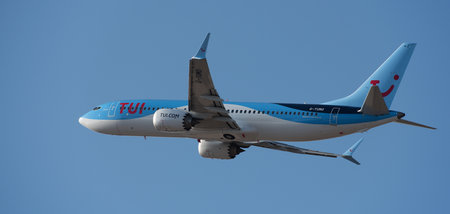 Tenerife, Spain February 14th, 2024. Boeing 737 MAX 8 TUI Airlines flies in the blue sky. Takeoff at Tenerife Airportのeditorial素材