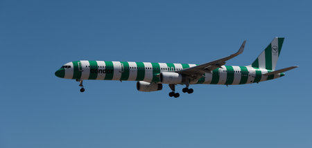 Tenerife, Spain May 3st, 2024. Boeing 757-330 Condor Airlines flies in the blue sky. Landing at...