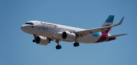 Tenerife, Spain May 4th, 2024. Airbus A320-251N Eurowings Airlines flies in the blue sky. Landing at Tenerife Airportのeditorial素材