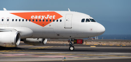 Tenerife, Spain May 4th, 2024. easyJet Airbus A320-214. Image of an easyJet Airlines plane taxiing at Tenerifeのeditorial素材