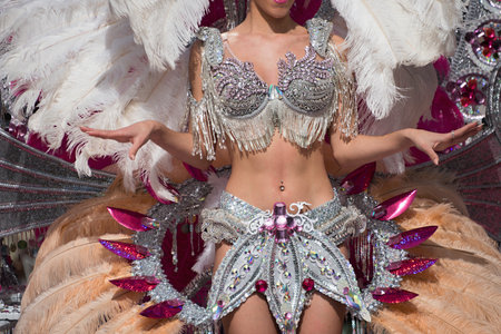 A woman in costume dancing on carnivalの写真素材