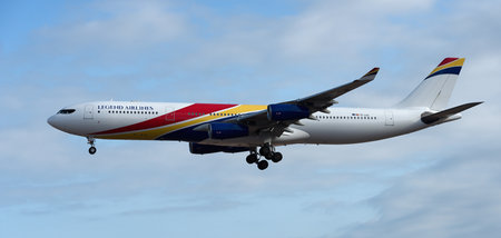 Tenerife, Spain August 28th, 2024. Airbus A340-313 Legend Airlines flies in the blue sky. Landing at Tenerife Airportのeditorial素材