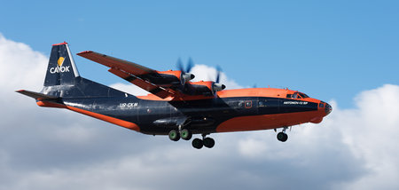 Tenerife, Spain january 9st, 2026. Antonov An-12BP Cavok Air Airlines flies in the blue sky. Landing at Tenerife Airportのeditorial素材