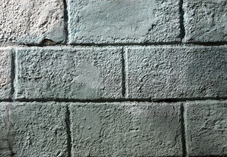 Old green and blue stylized wall. Architectural backgroundの写真素材
