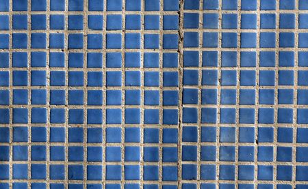 Blue mosaic wall texture. Architectural backgroundの写真素材