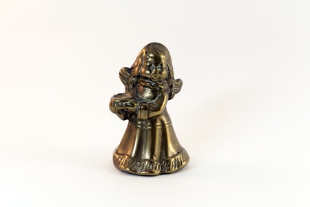 Bronze angel figure isolated on white. Collections and holidays.の写真素材