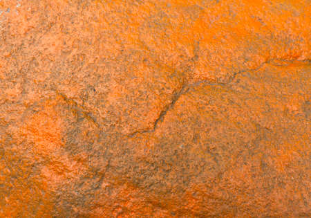 Orange painted stone texture. color background and texture.の写真素材